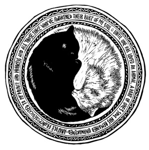 image of block print of black cat and white cat