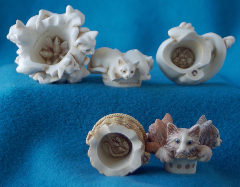 inside cat figurines