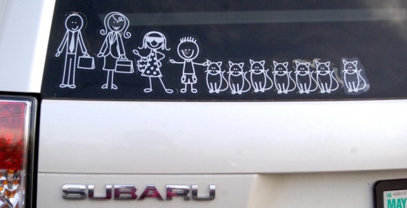 car with family stickers