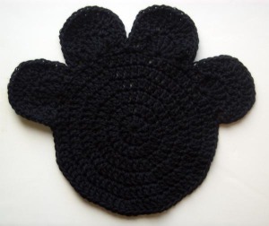 black crocheted pawprint