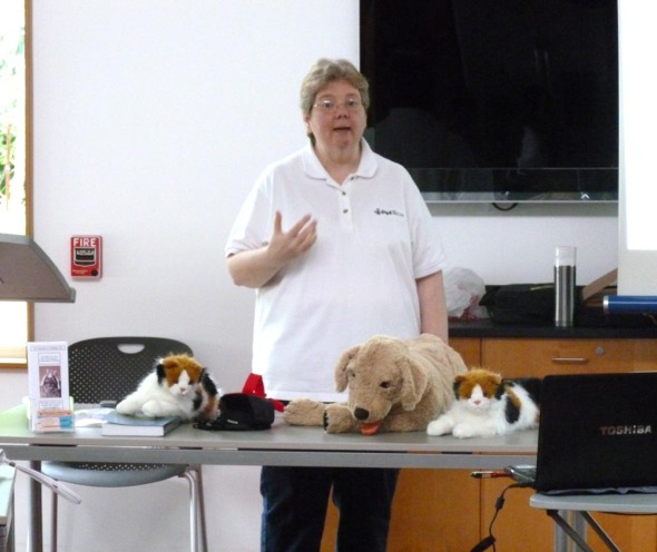 Karen Sable with cat and dog models.