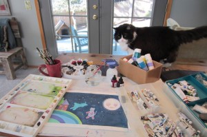 artist's studio with cat